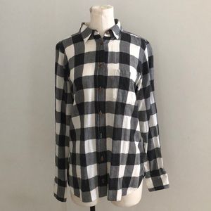 Gray and white plaid button down longsleeve shirt.